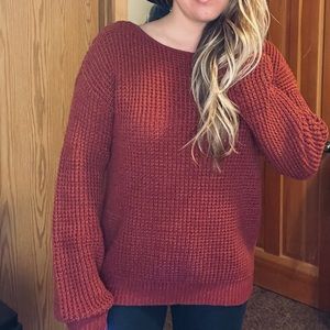 Large knit sweater with extra long sleeves